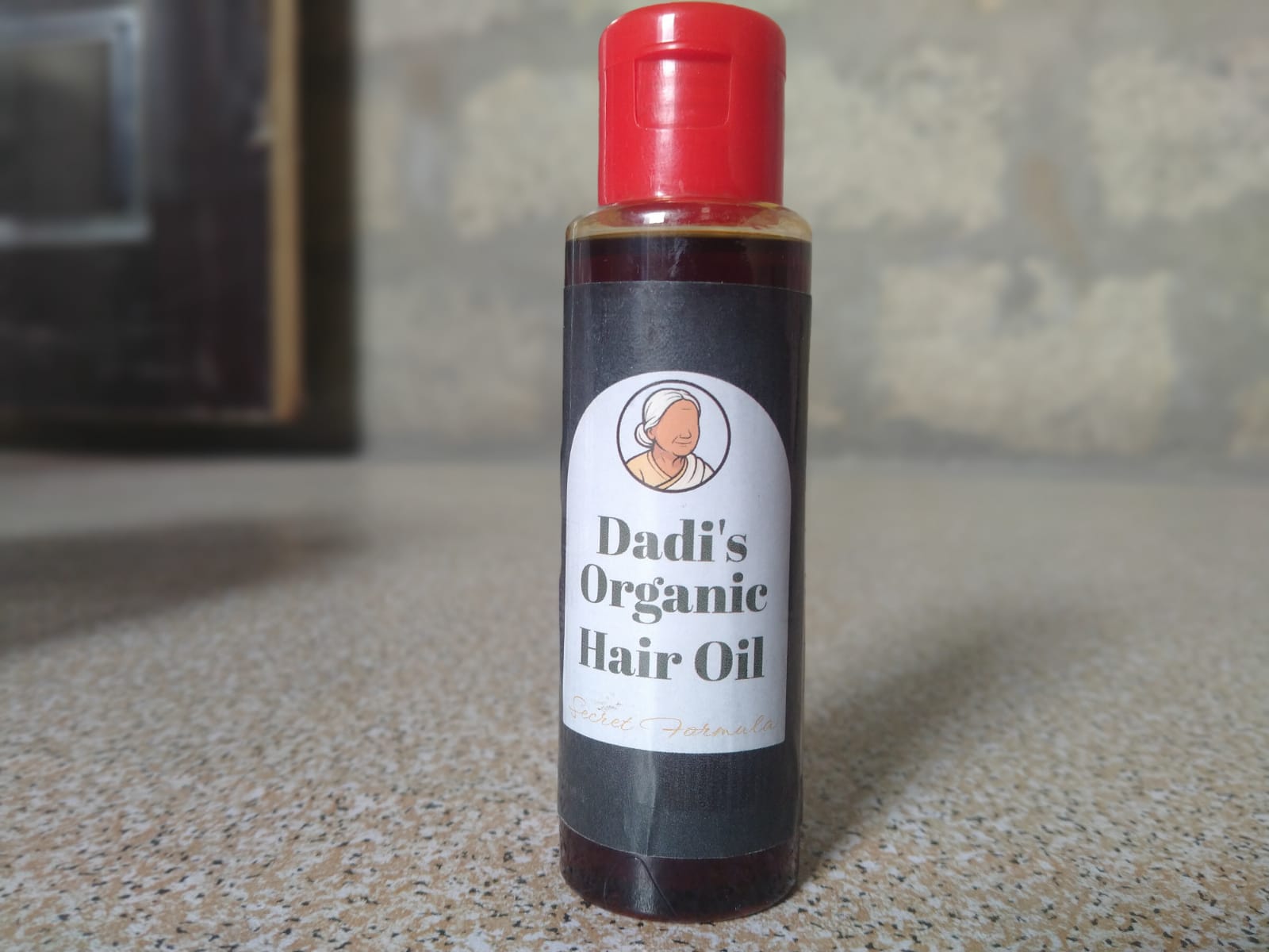 Dadi’s Organic Hair Oil: The Ayurvedic Secret for Ultimate Hair Health. This Cold-Pressed, Herbal Elixir is Best for Combating Hair Fall 100ml