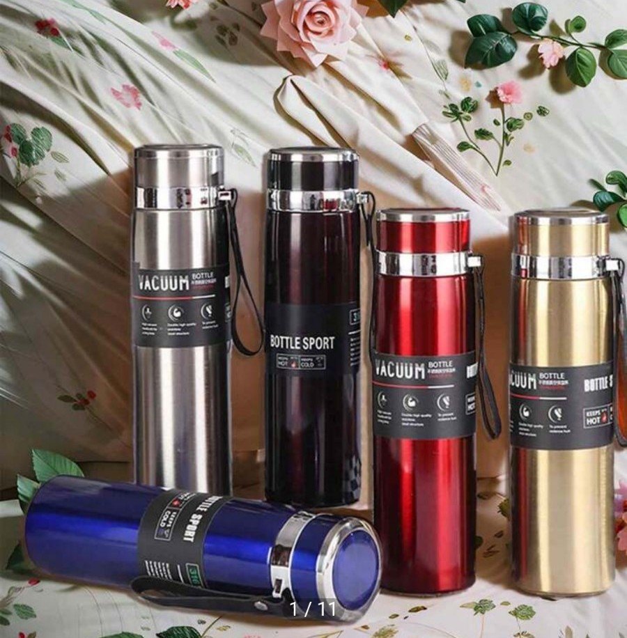 Vacuum Insulated Stainless Steel Sports Bottle with Integrated Carry Strap and Leak-Proof Lid ( RANDOM COLOUR )
