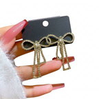 PQT-985 Touch Of Glamour To Your Look With These Bow Shape Zircon Korean Earrings – Color Golden