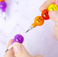 4 Pcs Smiley Cartoon Stationery Pencils – Fun Rainbow Pens with Cute Funny Faces for Kids, Students, and Gifts (Random Color)