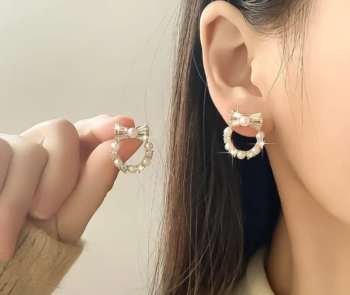 Pearl Bow Korean Zircon Earrings for Women – Elegant Bowknot Design with Sparkling Zircon and Pearl Accents | Premium Golden and Silver Fashion Jewelry for Weddings, Parties, and Everyday Wear | AXT-100