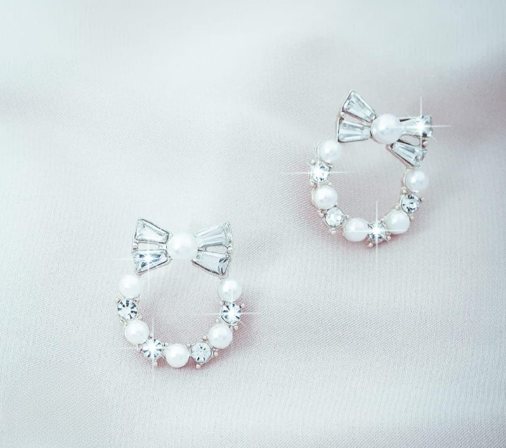 Pearl Bow Korean Zircon Earrings for Women – Elegant Bowknot Design with Sparkling Zircon and Pearl Accents | Premium Golden and Silver Fashion Jewelry for Weddings, Parties, and Everyday Wear | AXT-100