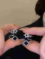 Sparkling Clover Star Earrings – Gold Plated Fashion Jewelry with Black Enamel &amp; Crystal Detailing ( PXJ-107)