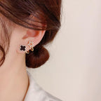 Sparkling Clover Star Earrings – Gold Plated Fashion Jewelry with Black Enamel &amp; Crystal Detailing ( PXJ-107)