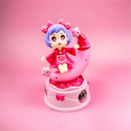 Rotating Moon Doll Toy With LED Lights &amp; Music – Adorable Crescent Moon Design, Universal Rotation, Safe for Kids 3+, Pink &amp; Purple Gift for Fun and Sensory Play (Random Color)